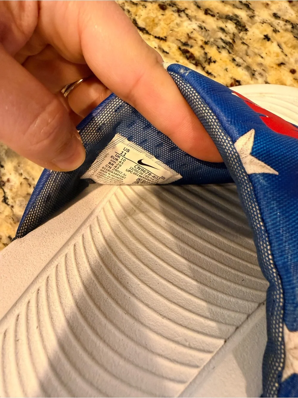 Nike Men’s White Slide Sandals with Blue Star Strap